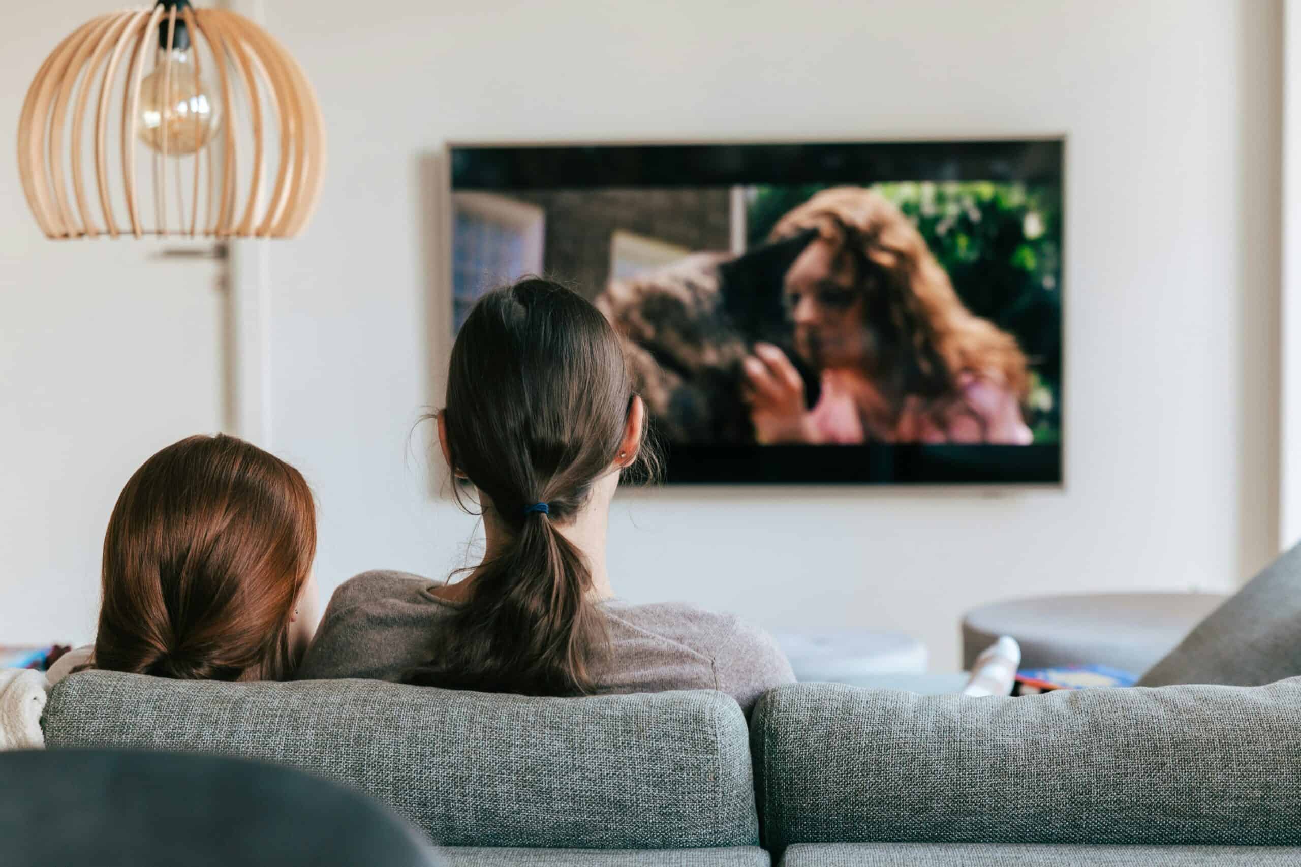 Family enjoying movie night